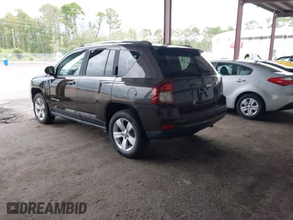 2014 Jeep Compass Latitude with VIN 1C4NJCEB5ED691041, listed as a IAAI auction lot 43112471 with 117,596 mi miles and . Bid and sale history available at DreamBid. Image 3.