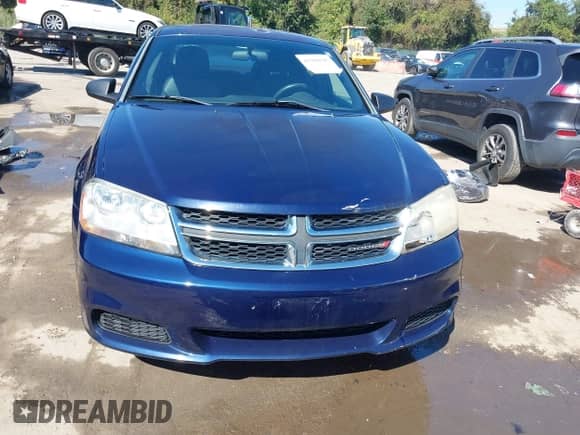 2013 Dodge Avenger SE with VIN 1C3CDZAB5DN580929, listed as a IAAI auction lot 43360545 with 96,172 mi miles and . Bid and sale history available at DreamBid. Image 12.