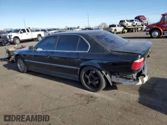 1999 BMW 7 Series 740iL with VIN WBAGH833XXDP05481, listed as a Copart auction lot 85510534 with 159,680 mi miles and Salvage title. Bid and sale history available at DreamBid. Image 2.