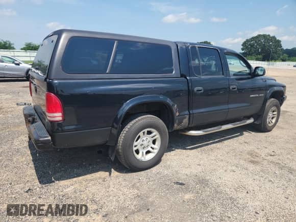 2002 Dodge Dakota Sport с VIN 1B7HG38N92S695375, выставлен на аукционе Copart как лот 66436435 с пробегом 171 504 миль миль и На запчасти • Non repairable. История ставок и продаж доступна на DreamBid. Изображение 3.