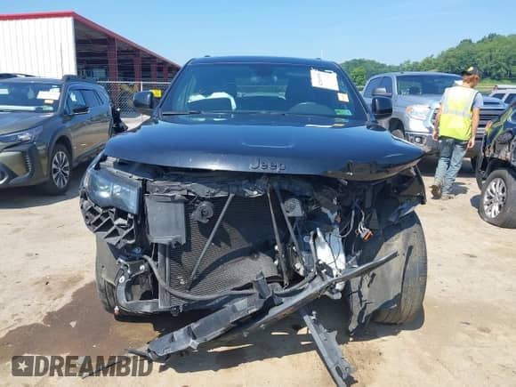 2021 Jeep Grand Cherokee Laredo E z VIN 1C4RJFAGXMC824014, wystawiony jako IAAI lot #42569558 z przebiegiem 52 810 mil mil oraz . Historia ofert i sprzedaży dostępna na DreamBid. Obrazek 13.