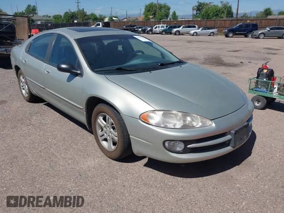 1999 Dodge Intrepid ES z VIN 2B3HD56J0XH648904, wystawiony jako IAAI lot #42542825 z przebiegiem 98 613 mil mil oraz . Historia ofert i sprzedaży dostępna na DreamBid. Obrazek 1.