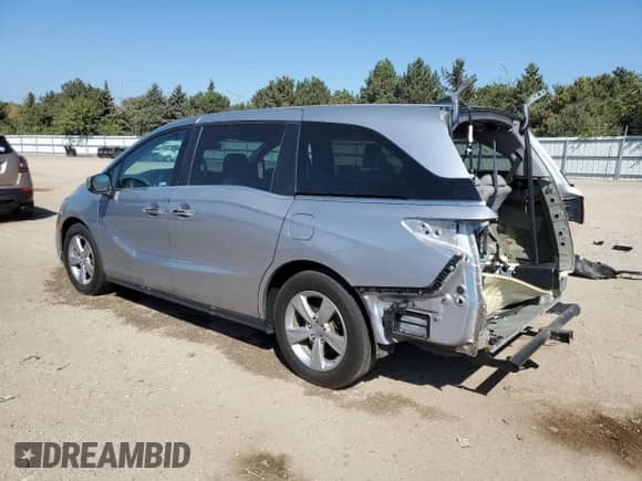 2019 Honda Odyssey EX-L with VIN 5FNRL6H73KB089439, listed as a Copart auction lot 84257055 with 106,664 mi miles and Salvage title. Bid and sale history available at DreamBid. Image 2.