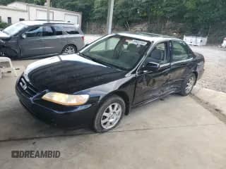 2002 Honda Accord SE with VIN 1HGCG56742A023287, listed as a Copart auction lot 69653165 with 293,796 mi miles and Salvage title. Bid and sale history available at DreamBid. Image 1.