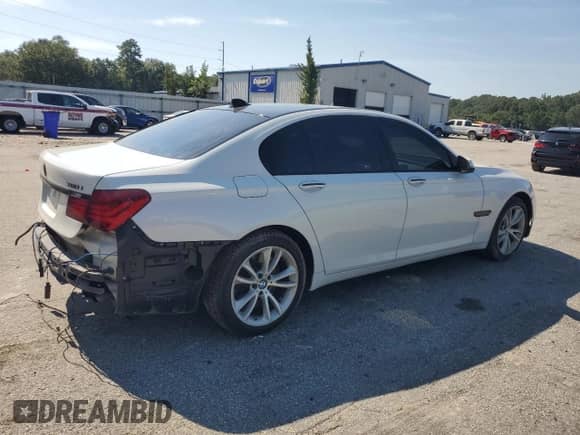 2015 BMW 7 Series 750i xDrive с VIN WBAYB6C55FD225245, выставлен на аукционе Copart как лот 69521095 с пробегом 139 606 миль миль и Списание • Salvage title. История ставок и продаж доступна на DreamBid. Изображение 3.
