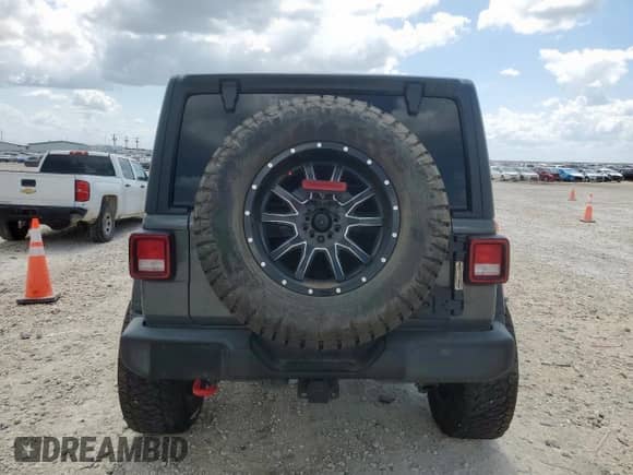 2021 Jeep Wrangler Unlimited 80th Anniversary с VIN 1C4HJXDG2MW846360, выставлен на аукционе Copart как лот 62721735 с пробегом 17 099 миль миль и Списание • Salvage title. История ставок и продаж доступна на DreamBid. Изображение 6.