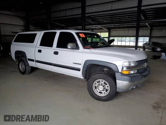 2001 Chevrolet Silverado 2500HD LS с VIN 1GCHC23UX1F106135, выставлен на аукционе Copart как лот 71551844 с пробегом 145 245 миль миль и Списание • Salvage title. История ставок и продаж доступна на DreamBid. Изображение 4.