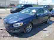 2015 Volvo S60 T5 Drive-E Premier with VIN YV126MFK9F1337917, listed as a IAAI auction lot 42518123 with 79,265 mi miles and . Bid and sale history available at DreamBid. Image 2.