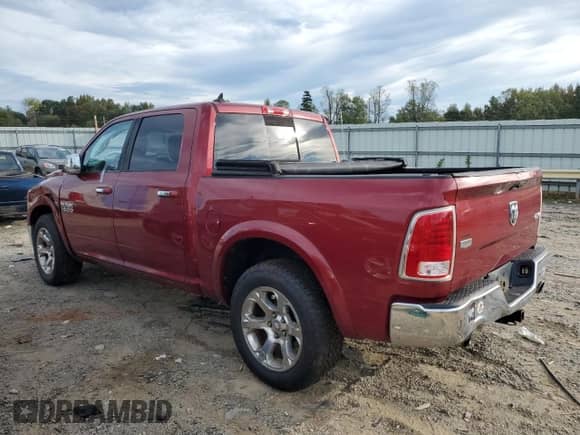 2014 Ram 1500 Laramie with VIN 1C6RR7NTXES375258, listed as a Copart auction lot 85677615 with 206,303 mi miles and Salvage title. Bid and sale history available at DreamBid. Image 2.
