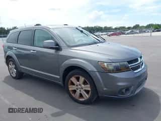 2012 Dodge Journey Crew with VIN 3C4PDCDG3CT207176, listed as a IAAI auction lot 43242158 with 173,632 mi miles and . Bid and sale history available at DreamBid. Image 1.
