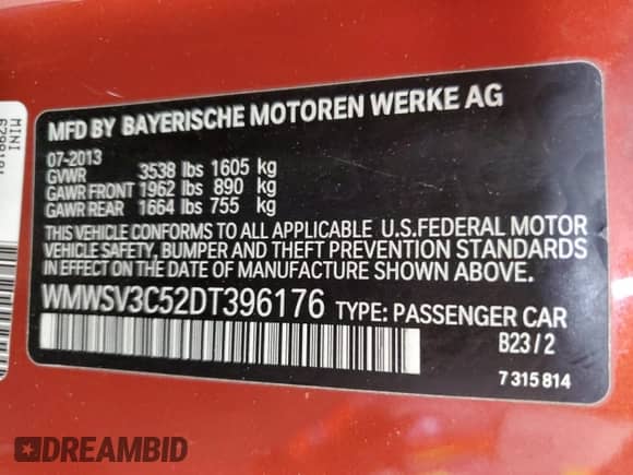 2013 MINI Hardtop S with VIN WMWSV3C52DT396176, listed as a Copart auction lot 59207165 with 104,194 mi miles and Salvage title. Bid and sale history available at DreamBid. Image 12.
