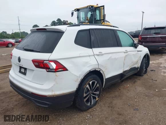 2022 Volkswagen Tiguan S z VIN 3VV1B7AX1NM144102, wystawiony jako IAAI lot #42324072 z przebiegiem 54 974 mil mil oraz . Historia ofert i sprzedaży dostępna na DreamBid. Obrazek 4.