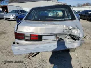 1994 Dodge Shadow with VIN 1B3AP28D5RN193704, listed as a Copart auction lot 82825004 with 90,223 mi miles and Salvage title. Bid and sale history available at DreamBid. Image 6.