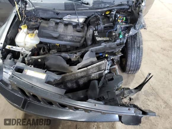 2010 Jeep Compass Sport z VIN 1J4NT1FB3AD647153, wystawiony jako Copart lot #61261595 z przebiegiem Nie podano mil oraz Nie do naprawy • Non repairable. Historia ofert i sprzedaży dostępna na DreamBid. Obrazek 12.