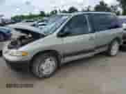 1999 Dodge Caravan SE with VIN 1B4GP45G7XB529075, listed as a Copart auction lot 60448215 with Not provided miles and Salvage title. Bid and sale history available at DreamBid. Image 1.