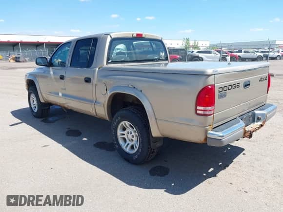 2002 Dodge Dakota SLT with VIN 1B7HG48N32S644931, listed as a IAAI auction lot 42320007 with 88,367 mi miles and . Bid and sale history available at DreamBid. Image 3.