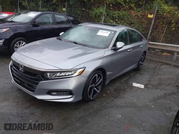 2020 Honda Accord Sport with VIN 1HGCV2F3XLA030229, listed as a IAAI auction lot 43283605 with 30,981 mi miles and . Bid and sale history available at DreamBid. Image 2.