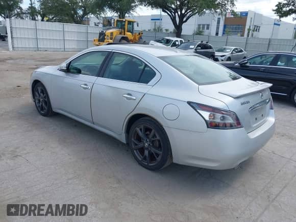 2014 Nissan Maxima S z VIN 1N4AA5APXEC444170, wystawiony jako IAAI lot #43251311 z przebiegiem 243 605 mil mil oraz . Historia ofert i sprzedaży dostępna na DreamBid. Obrazek 3.