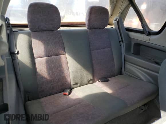 2000 Chevrolet Tracker z VIN 2CNBJ18C2Y6926554, wystawiony jako Copart lot #47293795 z przebiegiem 179 543 mil mil oraz Szkoda całkowita • Salvage title. Historia ofert i sprzedaży dostępna na DreamBid. Obrazek 11.