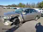 2002 Toyota Camry LE z VIN 4T1BE32K82U588621, wystawiony jako Copart lot #86985085 z przebiegiem 252 745 mil mil oraz Szkoda całkowita • Salvage title. Historia ofert i sprzedaży dostępna na DreamBid. Obrazek 1.