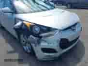 2012 Hyundai Veloster w/Gray Int z VIN KMHTC6AD0CU049684, wystawiony jako IAAI lot #43132772 z przebiegiem 114 146 mil mil oraz . Historia ofert i sprzedaży dostępna na DreamBid. Obrazek 6.