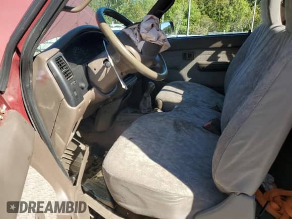 1996 Toyota Tacoma z VIN 4TAPM62N7TZ136944, wystawiony jako Copart lot #82388415 z przebiegiem 203 425 mil mil oraz Szkoda całkowita • Salvage title. Historia ofert i sprzedaży dostępna na DreamBid. Obrazek 7.