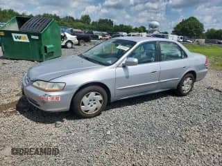 2002 Honda Accord LX with VIN 1HGCG16422A069716, listed as a Copart auction lot 64200665 with 90,976 mi miles and Salvage title. Bid and sale history available at DreamBid. Image 1.