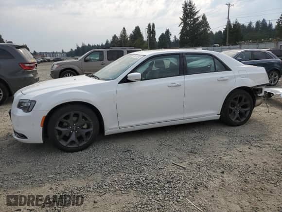 2023 Chrysler 300 S with VIN 2C3CCABG1PH633301, listed as a Copart auction lot 71511015 with 42,028 mi miles and Salvage title. Bid and sale history available at DreamBid. Image 1.