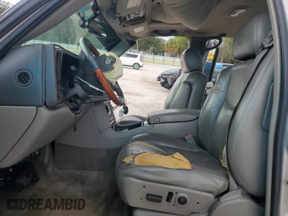 2004 Cadillac Escalade z VIN 1GYEK63N74R148393, wystawiony jako Copart lot #69752745 z przebiegiem 222 907 mil mil oraz Szkoda całkowita • Salvage title. Historia ofert i sprzedaży dostępna na DreamBid. Obrazek 7.