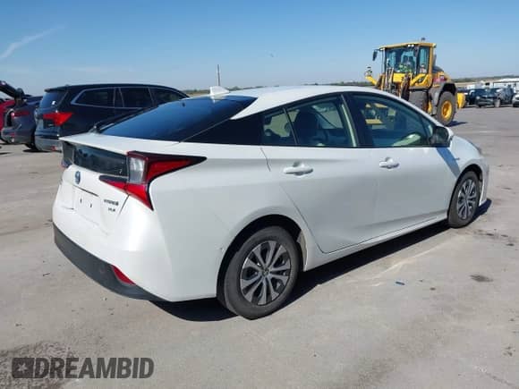 2021 Toyota Prius LE with VIN JTDL9MFU8M3029027, listed as a IAAI auction lot 43354130 with 66,497 mi miles and . Bid and sale history available at DreamBid. Image 4.