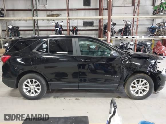 2020 Chevrolet Equinox LS z VIN 2GNAX5EVXL6255002, wystawiony jako IAAI lot #42166940 z przebiegiem 73 814 mil mil oraz . Historia ofert i sprzedaży dostępna na DreamBid. Obrazek 13.