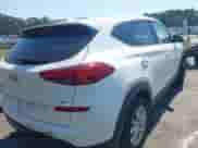 2019 Hyundai Tucson SE z VIN KM8J2CA42KU980257, wystawiony jako IAAI lot #43150990 z przebiegiem 117 808 mil mil oraz . Historia ofert i sprzedaży dostępna na DreamBid. Obrazek 4.