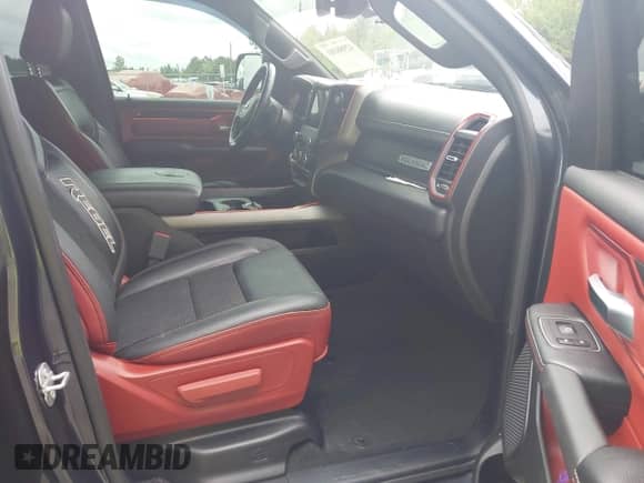 2020 Ram 1500 Rebel z VIN 1C6SRFLT0LN315399, wystawiony jako IAAI lot #42988101 z przebiegiem 93 786 mil mil oraz . Historia ofert i sprzedaży dostępna na DreamBid. Obrazek 5.