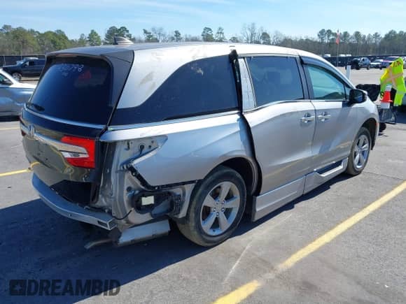 2019 Honda Odyssey EX-L with VIN 5FNRL6H73KB073550, listed as a IAAI auction lot 41666490 with 40,518 mi miles and . Bid and sale history available at DreamBid. Image 4.