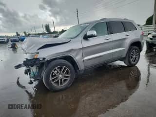 2017 Jeep Grand Cherokee Limited with VIN 1C4RJEBG6HC934007, listed as a Copart auction lot 80958775 with 141,111 mi miles and Salvage title. Bid and sale history available at DreamBid. Image 1.