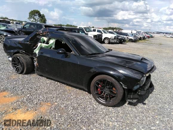 2022 Dodge Challenger R/T Scat Pack Widebody z VIN 2C3CDZFJ9NH140206, wystawiony jako IAAI lot #42726610 z przebiegiem 32 618 mil mil oraz . Historia ofert i sprzedaży dostępna na DreamBid. Obrazek 1.