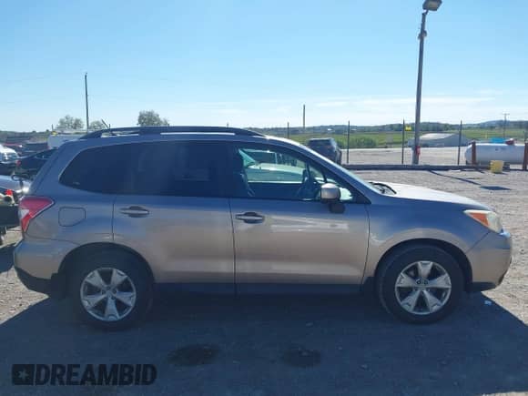 2014 Subaru Forester Premium with VIN JF2SJAEC4EH555980, listed as a IAAI auction lot 43108600 with 185,821 mi miles and . Bid and sale history available at DreamBid. Image 13.