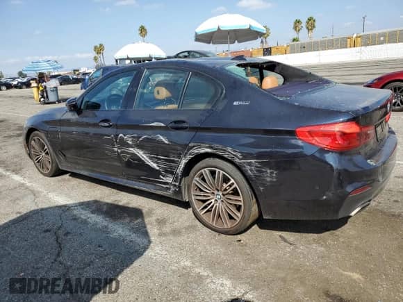 2019 BMW 5 Series 530e с VIN WBAJA9C54KB388173, выставлен на аукционе Copart как лот 81910625 с пробегом 114 665 миль миль и Списание • Salvage title. История ставок и продаж доступна на DreamBid. Изображение 2.