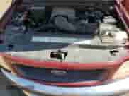 1997 Ford F-150 XL z VIN 1FTEX17L4VKC42857, wystawiony jako Copart lot #68759105 z przebiegiem 96 657 mil mil oraz Szkoda całkowita • Salvage title. Historia ofert i sprzedaży dostępna na DreamBid. Obrazek 11.