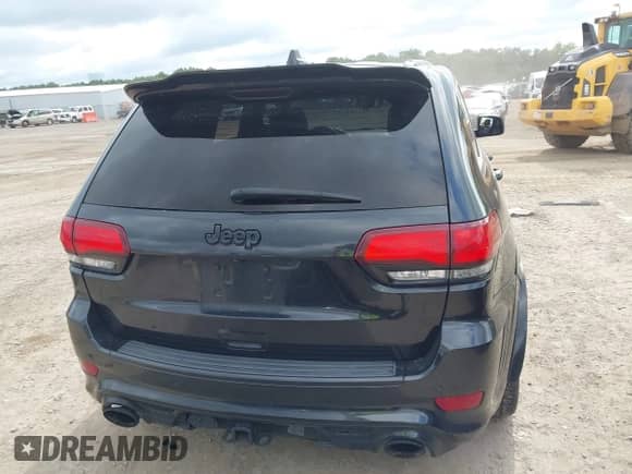 2015 Jeep Grand Cherokee SRT with VIN 1C4RJFDJ8FC768262, listed as a IAAI auction lot 42739805 with 86,840 mi miles and . Bid and sale history available at DreamBid. Image 17.