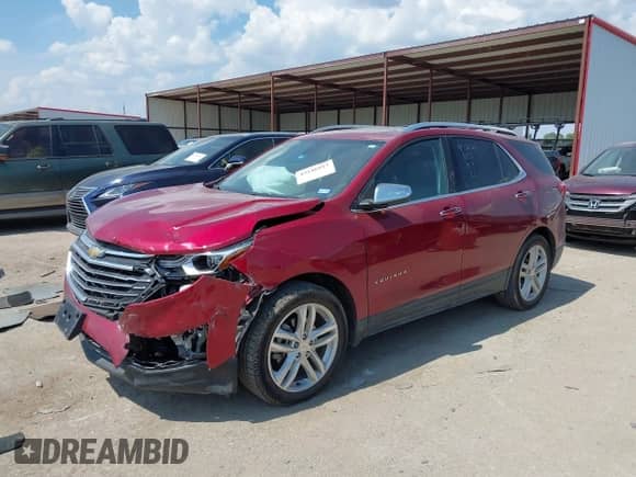 2018 Chevrolet Equinox Premier with VIN 3GNAXNEX1JL304730, listed as a IAAI auction lot 43246817 with 69,934 mi miles and . Bid and sale history available at DreamBid. Image 2.