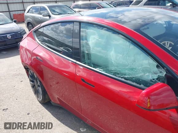 2022 Tesla Model Y Performance with VIN 7SAYGDEF3NF379624, listed as a IAAI auction lot 42705016 with Not provided miles and . Bid and sale history available at DreamBid. Image 6.