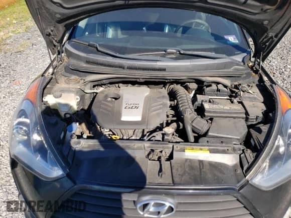 2013 Hyundai Veloster Turbo с VIN KMHTC6AE0DU110297, выставлен на аукционе Copart как лот 84737755 с пробегом 121 341 миль миль и Списание • Salvage title. История ставок и продаж доступна на DreamBid. Изображение 11.