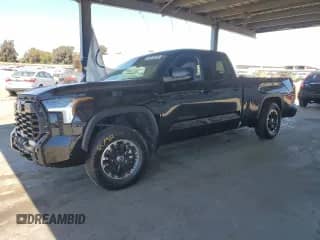 2023 Toyota Tundra SR5 with VIN 5TFLA5DA7PX129459, listed as a Copart auction lot 67829615 with 59,761 mi miles and Salvage title. Bid and sale history available at DreamBid. Image 1.