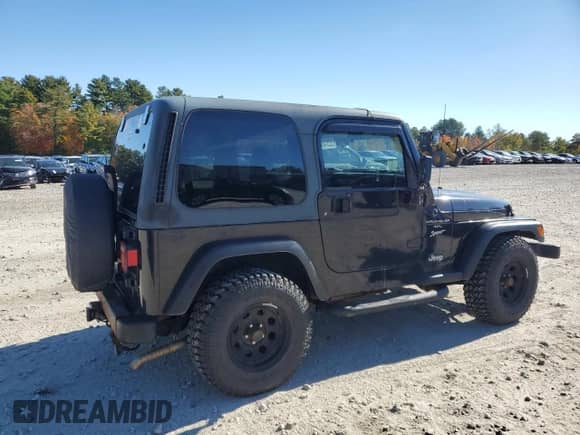 2000 Jeep Wrangler Sport with VIN 1J4FA49S1YP796600, listed as a Copart auction lot 82574545 with 128,340 mi miles and Clean title. Bid and sale history available at DreamBid. Image 3.