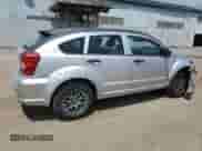 2009 Dodge Caliber SE with VIN 1B3HB28A59D161361, listed as a Copart auction lot 64144715 with 173,288 mi miles and Clean title. Bid and sale history available at DreamBid. Image 3.