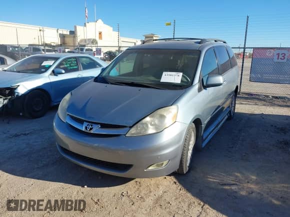 2007 Toyota Sienna XLE z VIN 5TDZK22CX7S074330, wystawiony jako IAAI lot #43581378 z przebiegiem 154 868 mil mil oraz . Historia ofert i sprzedaży dostępna na DreamBid. Obrazek 2.