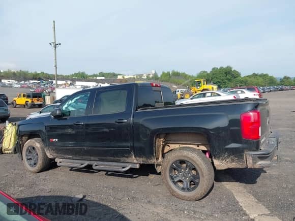 2017 Chevrolet Silverado 1500 LTZ z VIN 3GCUKSEJ0HG321648, wystawiony jako IAAI lot #42701782 z przebiegiem 143 515 mil mil oraz . Historia ofert i sprzedaży dostępna na DreamBid. Obrazek 14.