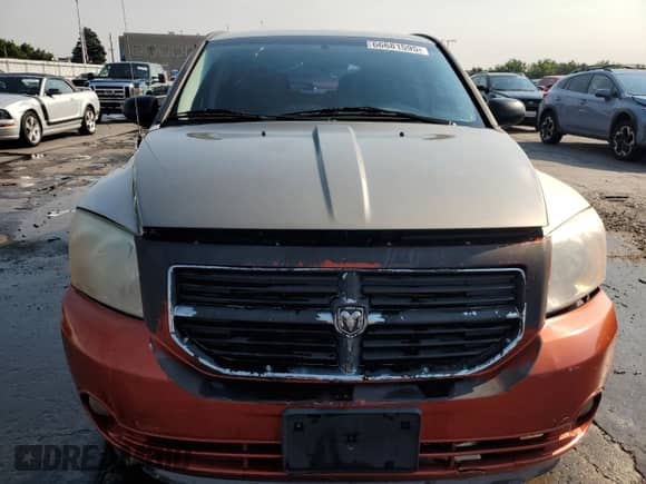 2009 Dodge Caliber SE with VIN 1B3HB28A99D151772, listed as a Copart auction lot 66681595 with 189,648 mi miles and Salvage title. Bid and sale history available at DreamBid. Image 5.