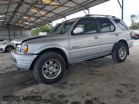 2000 Honda Passport LX with VIN 4S6CK58W3Y4401322, listed as a Copart auction lot 70466595 with 189,630 mi miles and Salvage title. Bid and sale history available at DreamBid. Image 1.